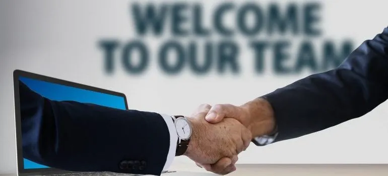 Two people shaking hands.