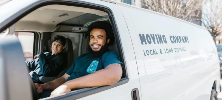 Movers inside a van can help moving to Potomac