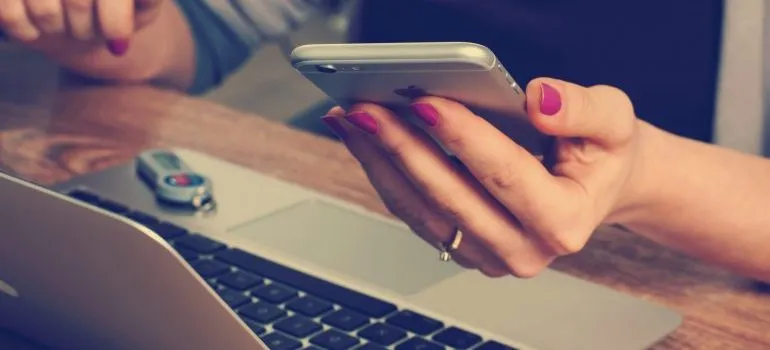 woman holding a phone