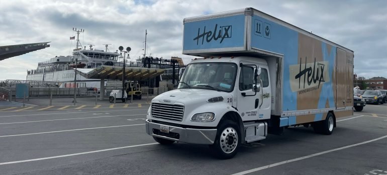 A moving truck on the road.
