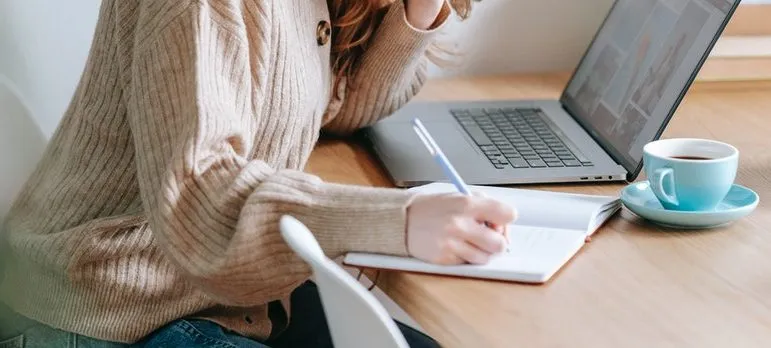 A person creating a list