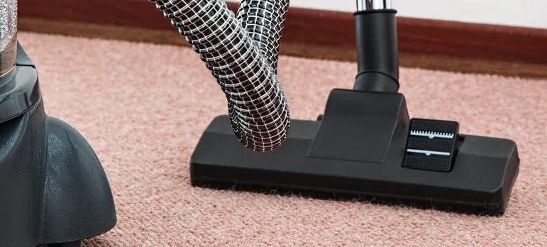 vacuum cleaner on the carpet