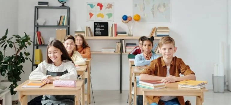 Children in classroom after moving to North Potomac