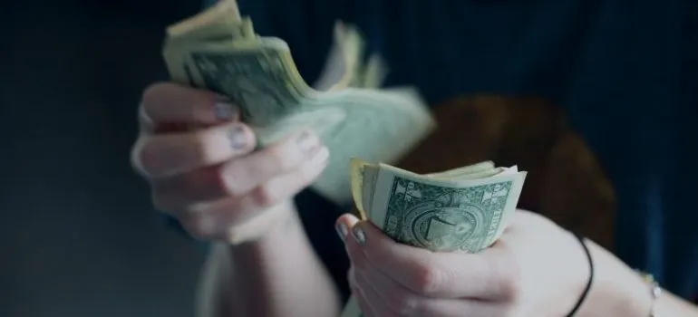 person counting money