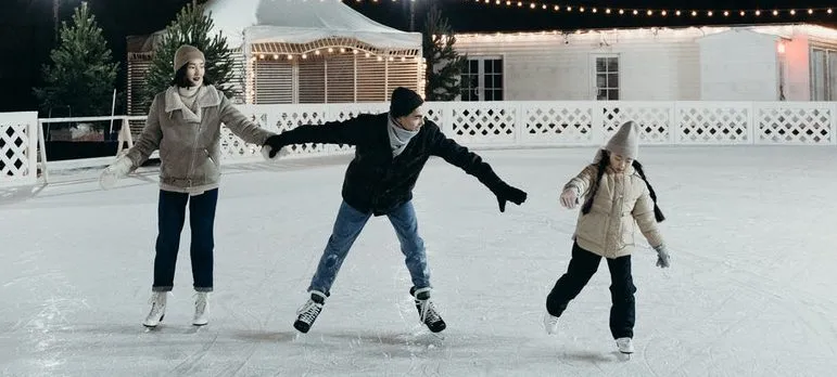 family ice skating thinking about things to do in Rockville as a new resident