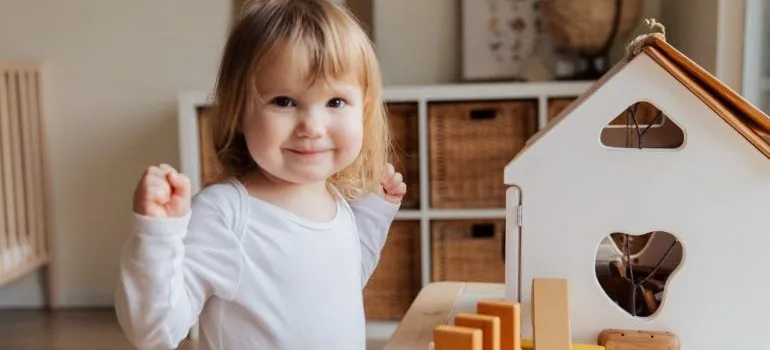Girl playing in her room