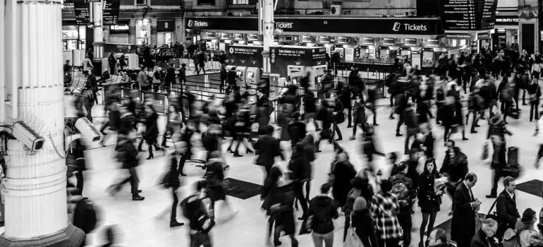 People are walking in a train station