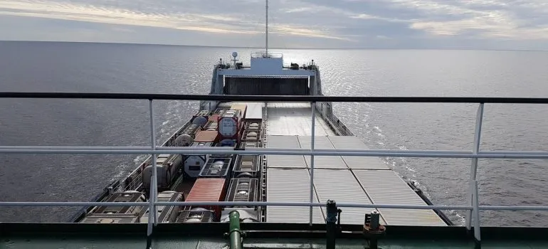 a picture of the front of a carrier ship in the open sea