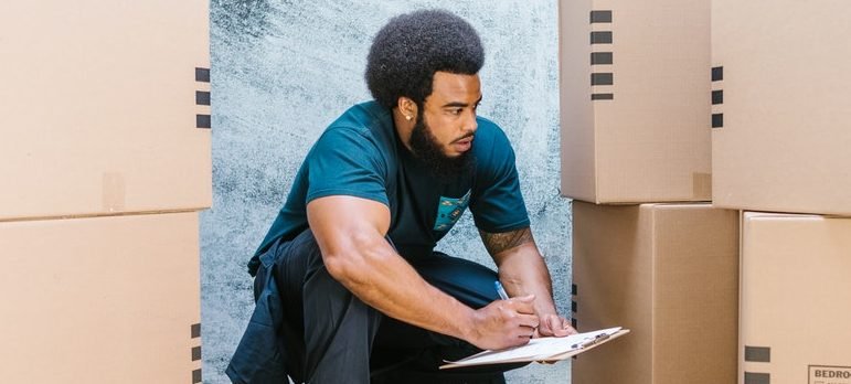 professional mover on the job while implementing interstate moving safety tips