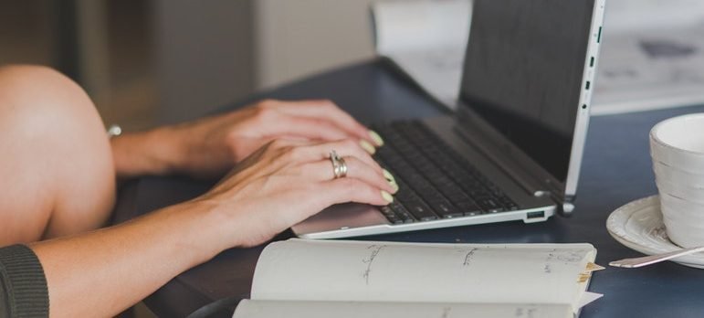 a woman using a laptop