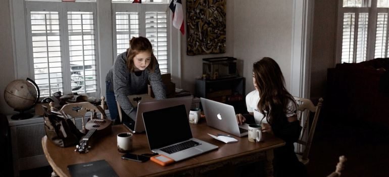 women working in a small office
