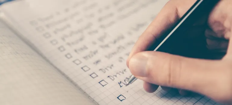 man making a checklist