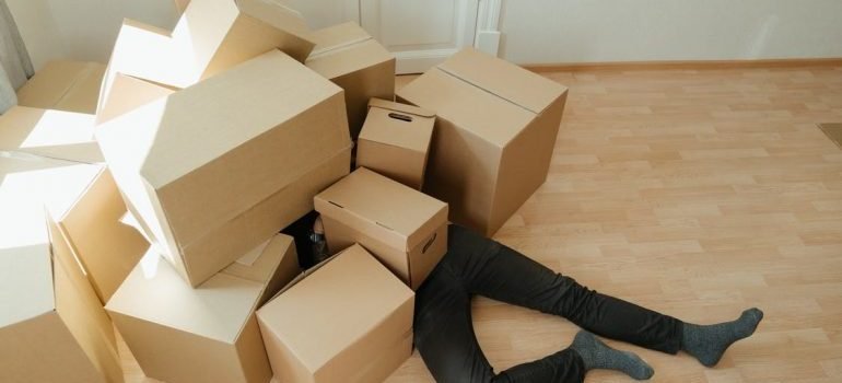 A man under the boxes