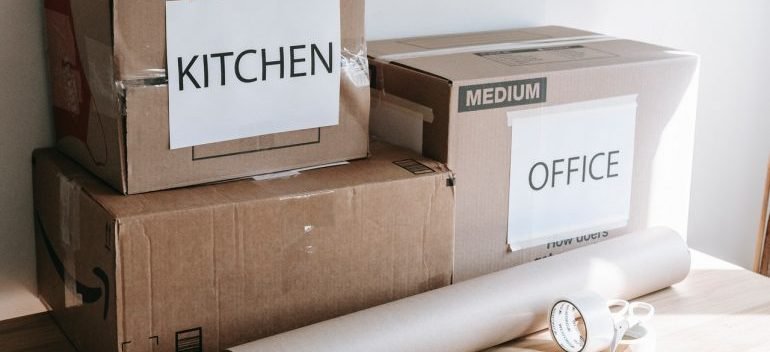 labeled boxes on a wooden table