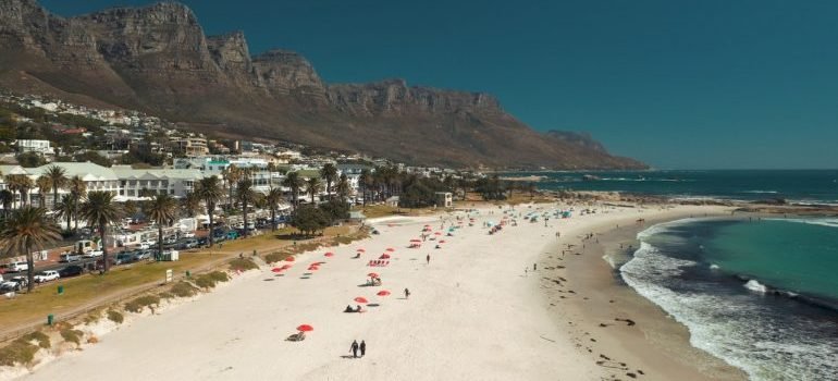 people walking on the beach