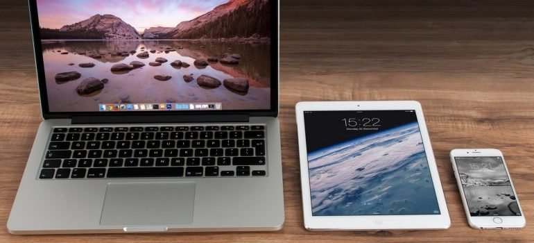 Laptop, tablet and phone on the desk