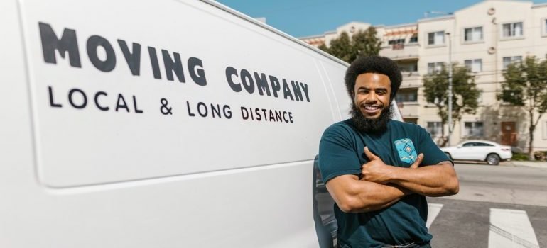 Moving company van and worker