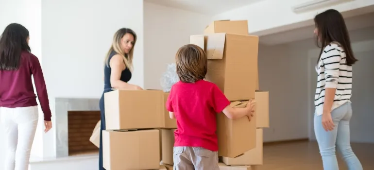 A family surrounded with boxes