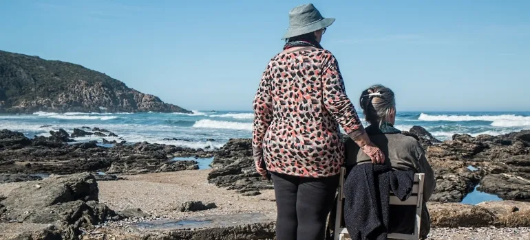 two elderly women at the beach thinking about the best places for seniors in Virginia