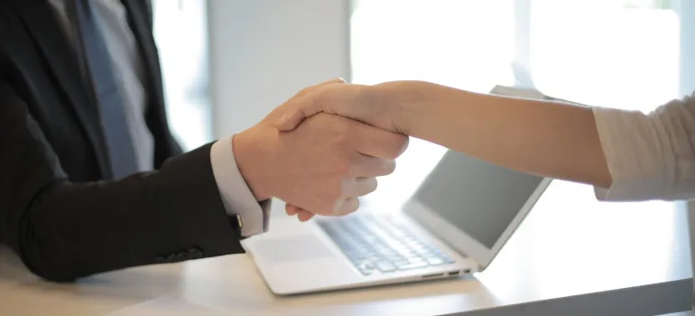 Two people shaking hands