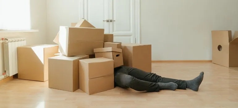 man with moving boxes