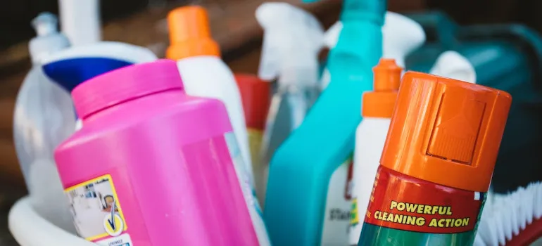 Cleaning supplies in a bucket