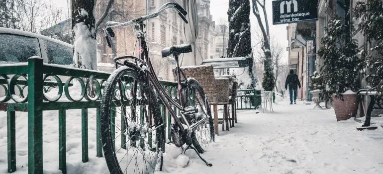 Bike on the street on a snowy day