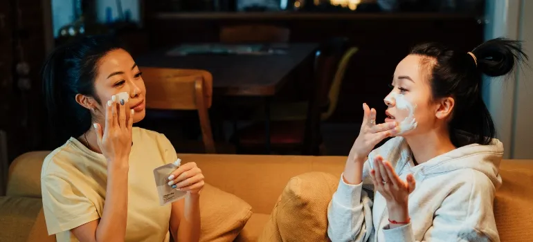 Two friends doing a beauty routine