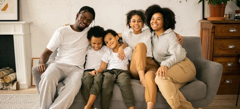 family sitting on the couch