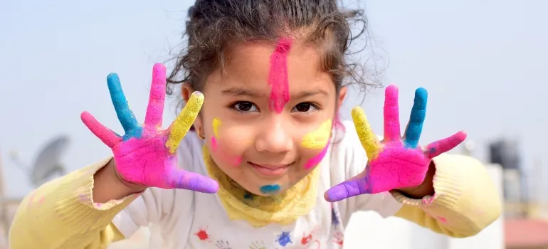 A child with finger paint