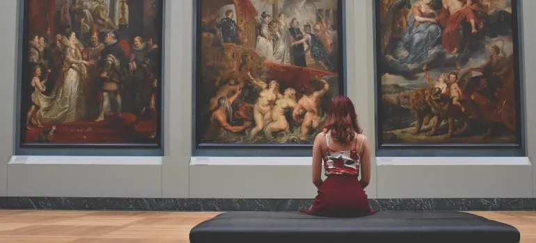 Woman sitting in a museum