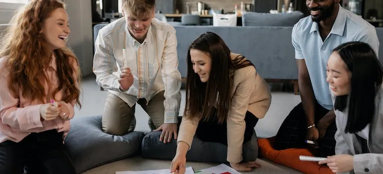 A Group of People Having a Meeting in the Office