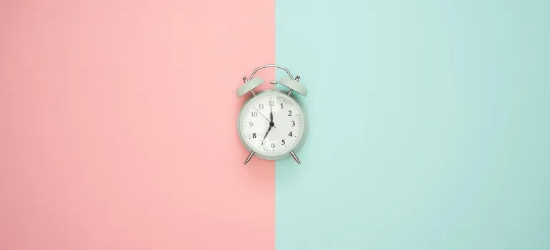 clock on the red and blue background