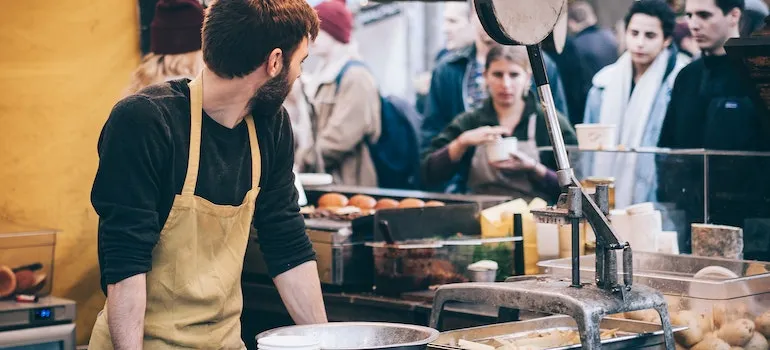 picture of a man in the kitchen, preparing for Local festivals in Montgomery County