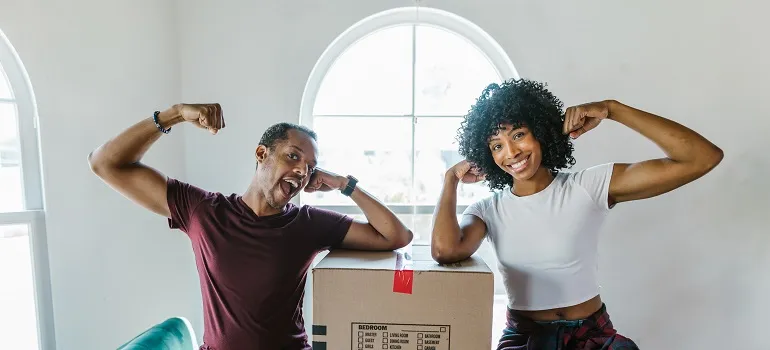 movers smiling and posing