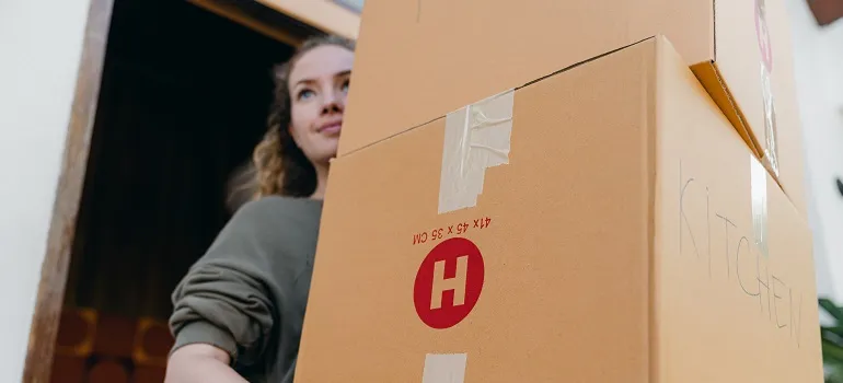 a girl learning How to pack for a North Potomac move