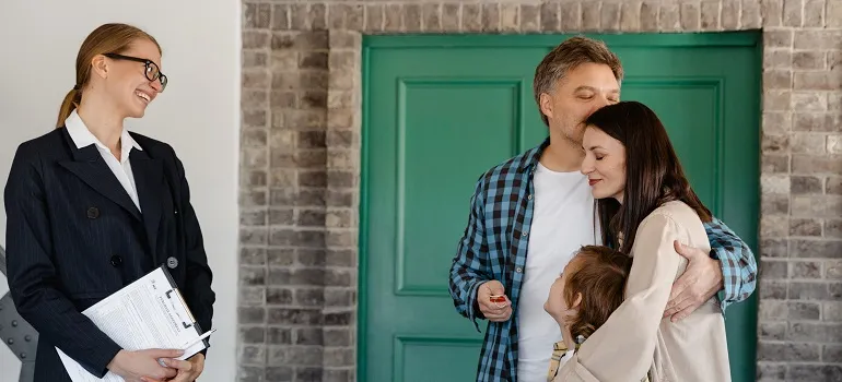 a couple entering a home