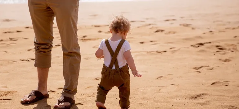 a father and son walking in Summer