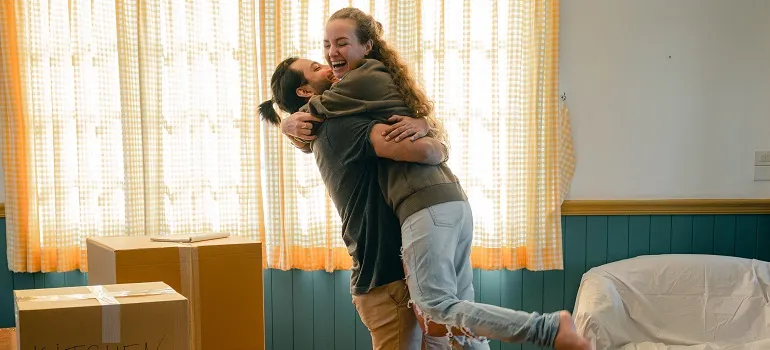 a couple in a new home in NYC after deciding on Washington DC vs. NYC living standards