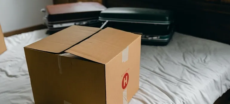 a moving box on a bed