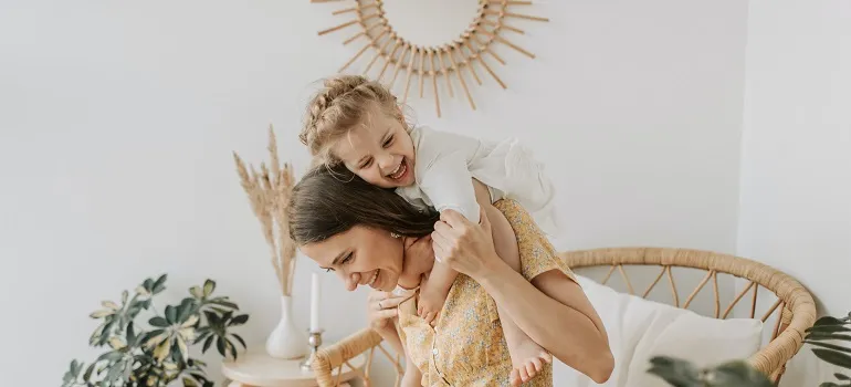 family enjoying their new home after they learned to choose a neighborhood before moving to NC