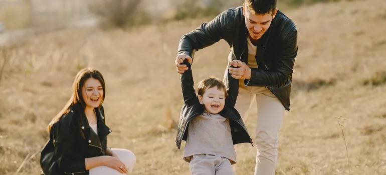family playing outdoors in one of the best locations in Northern Virginia