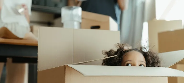 a child in a moving box