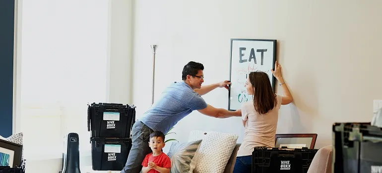 a family packing their belongings