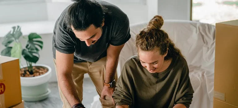a happy couple in a new home