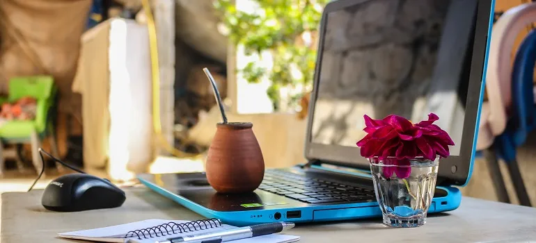 a desk of a someone who knows all the moving tips for digital nomads