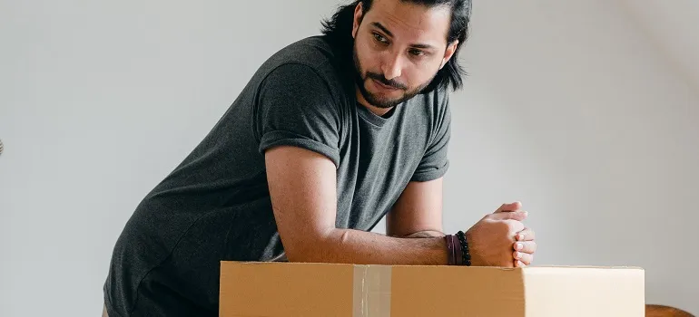 Overcoming Moving Anxiety -a man facing challenges of an interstate relocation