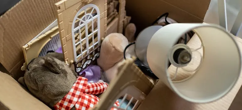 A box of memories you need to organize before moving into a smaller home.