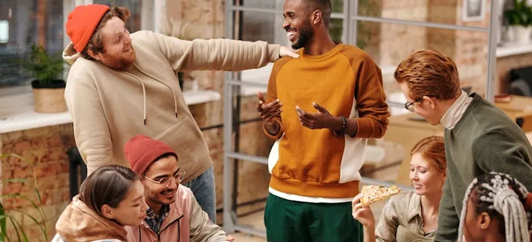 friends sitting around the table and talking