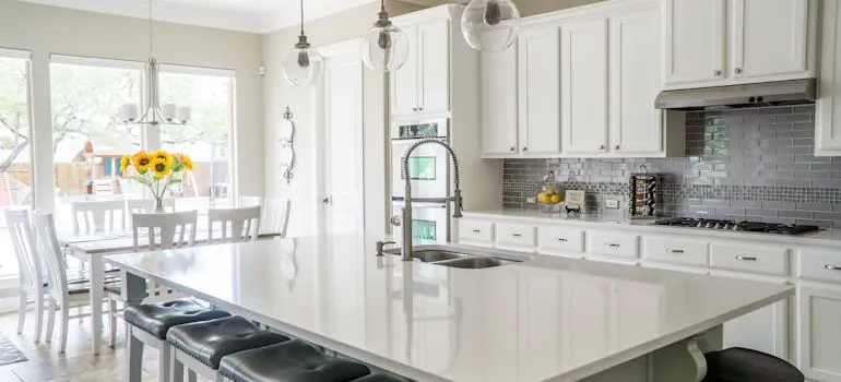 A white kitchen you can get in your new home after exploring real estate market in Bethesda.
